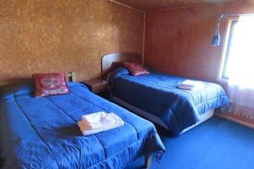 پانسیون Hostal Y Cabañas Perla Del Lago