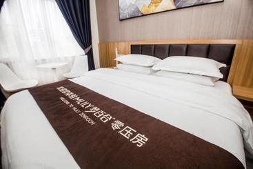 هتل Qingdao Tangman