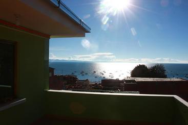 پانسیون Hostal Algas Del Titicaca