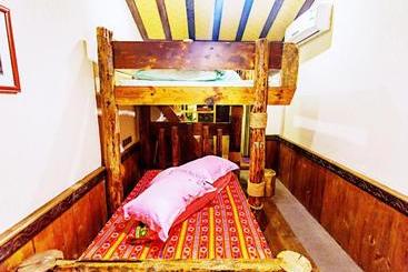 پانسیون Dielianhua Cowherd Inn Zhangjiajie