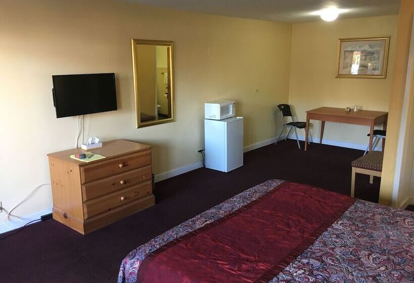 فندق على الطريق Midway Inn & Suites