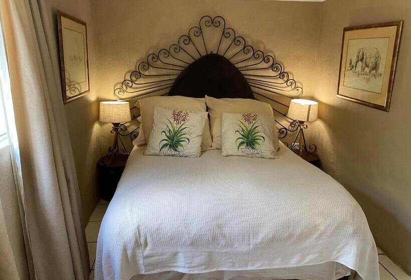 بنسيون Bohemian Garden Cottages