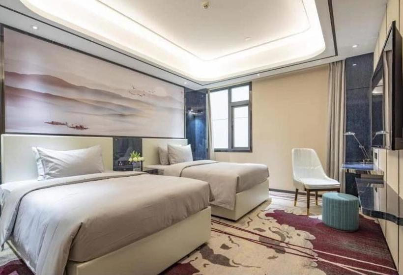 فندق Ramada By Wyndham Mengzi Suites