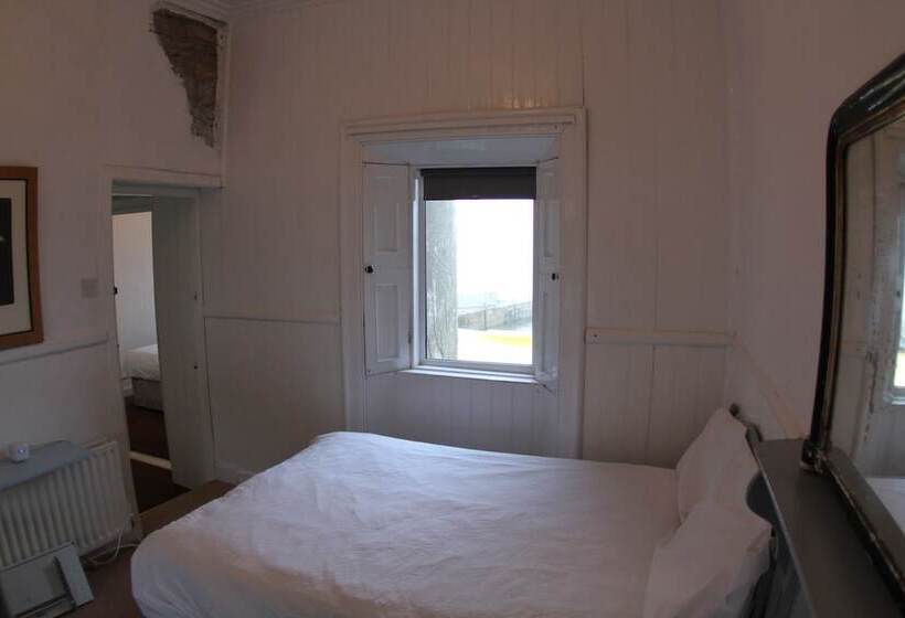 فندق The Boathouse Lodge