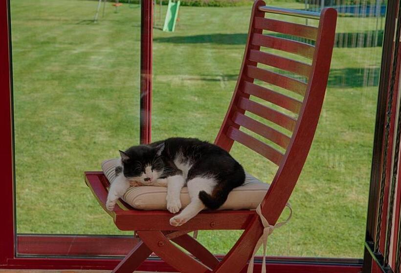 فندق Au Jardin Fleuri