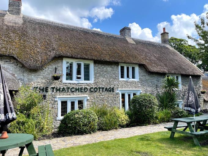 Отель The Thatched Cottage Inn