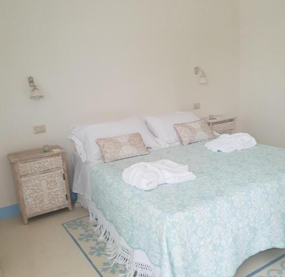 تختخواب و صبحانه Trullitria Rooms