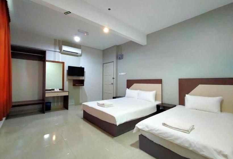 فندق Oyo 89934 Rose Village Inn 1