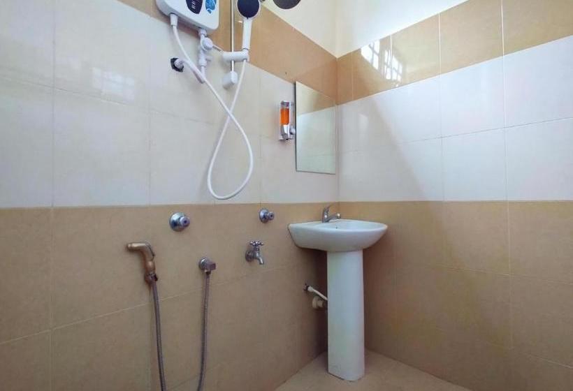 فندق Oyo 89934 Rose Village Inn 1