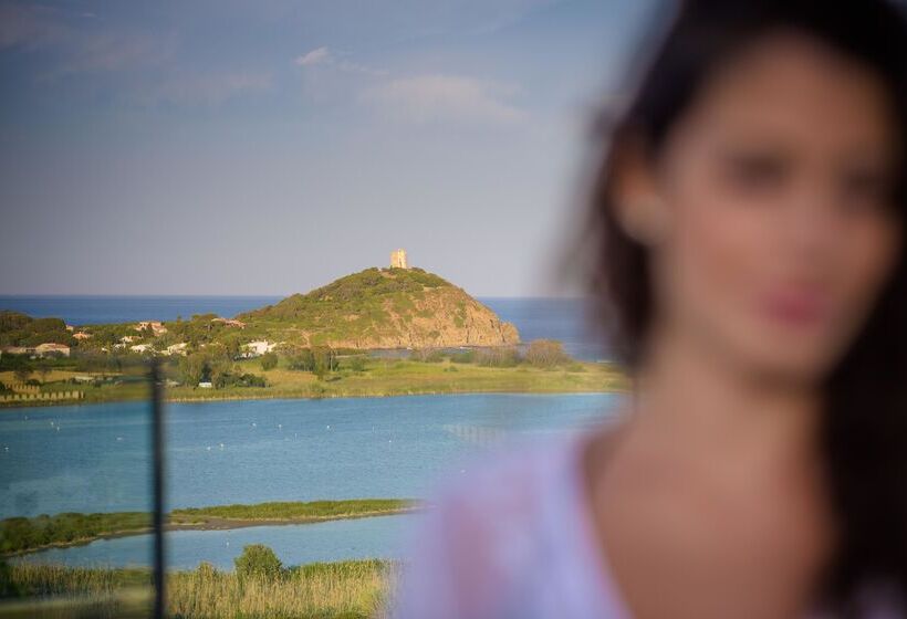 Отель Baia Di Chia Resort Sardinia, Curio Collection By Hilton