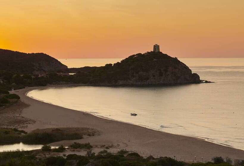 Отель Baia Di Chia Resort Sardinia, Curio Collection By Hilton