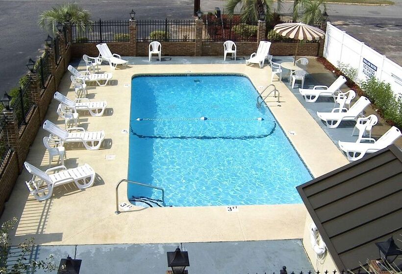 Отель Travelers Inn & Suites