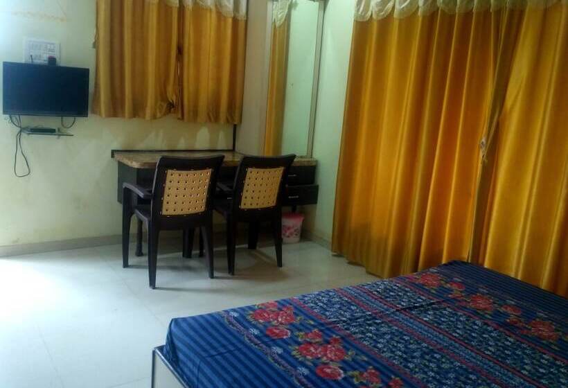 호텔 Om Sai Chattra Icon Residency