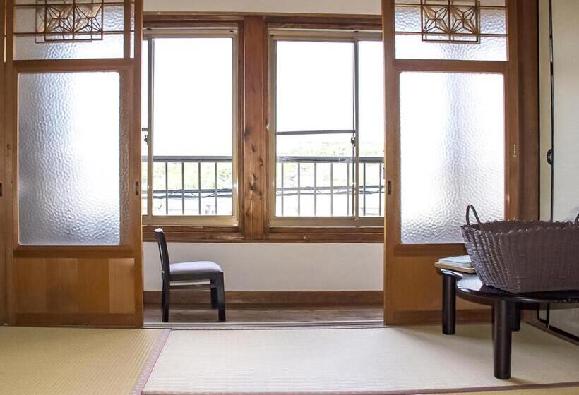 بنسيون Guest Cafe Kuchikumano