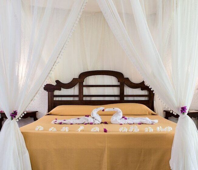 בית מלון כפרי Karafuu Beach Resort & Spa