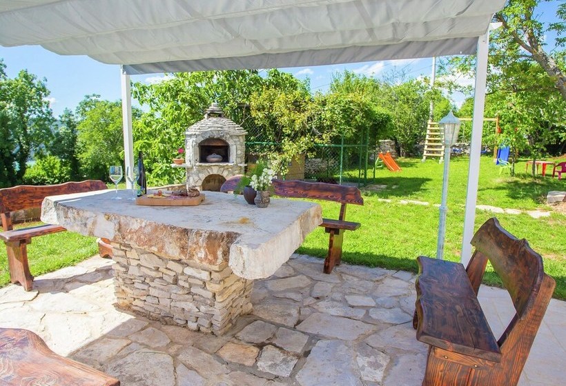 Surrounded By Beautiful Mediterranean Vegetation And The Crystal Clear Sea