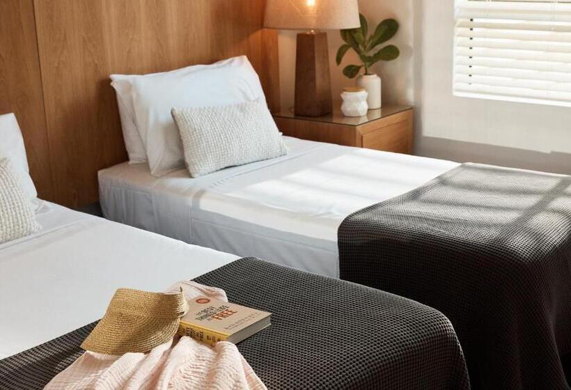 Отель Sea Change Beachfront Apartments