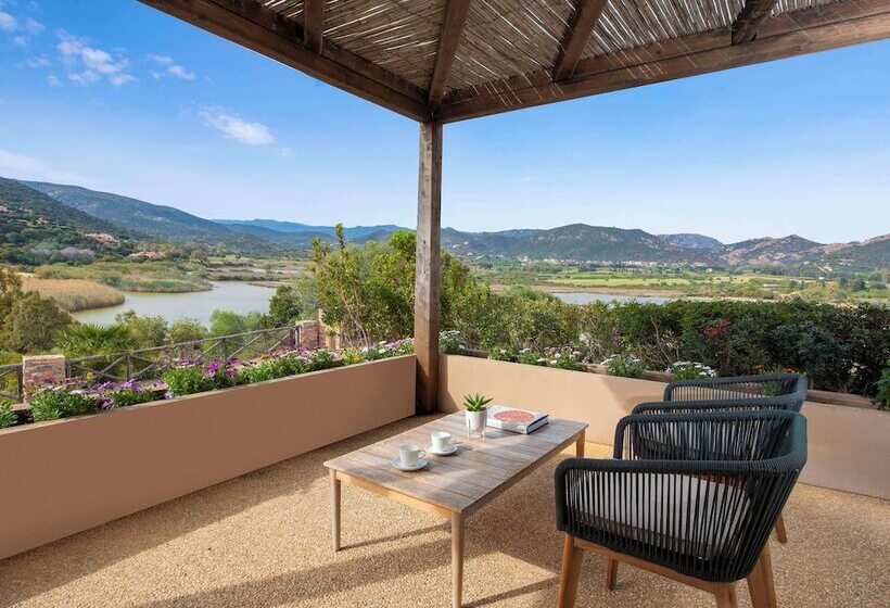 Отель Baia Di Chia Resort Sardinia, Curio Collection By Hilton