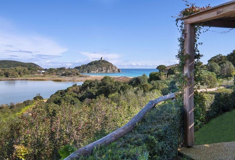 Отель Baia Di Chia Resort Sardinia, Curio Collection By Hilton