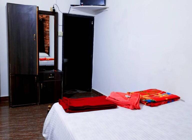 بنسيون Om Sai Guest House