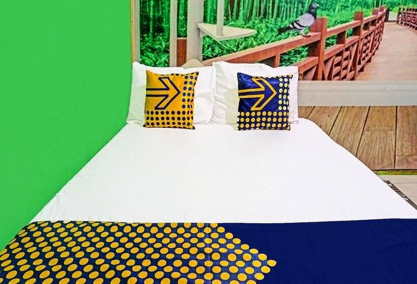 ホテル Spot On 91697 Nyaman Homestay Syariah