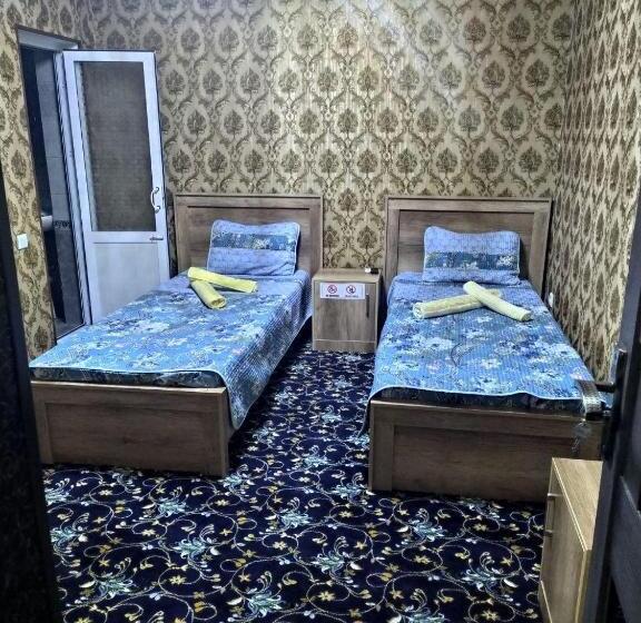 مبيت وإفطار Uvaysiy Family Guest House