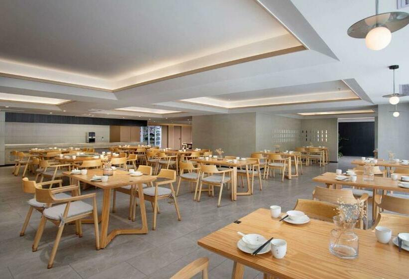 Отель Ramada Encore By Wyndham Jiusuo Downtown