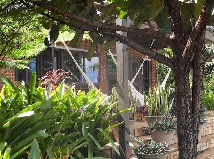 تختخواب و صبحانه Rainforest Inn