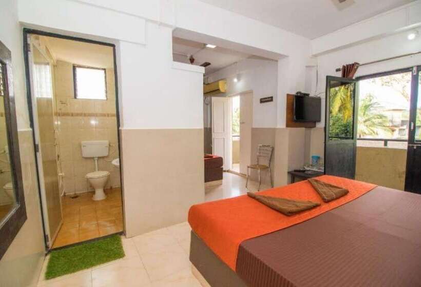 酒店 Goroomgo Travellers Inn Goa