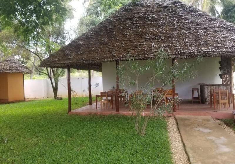 בית מלון כפרי Calamari Beach Villas