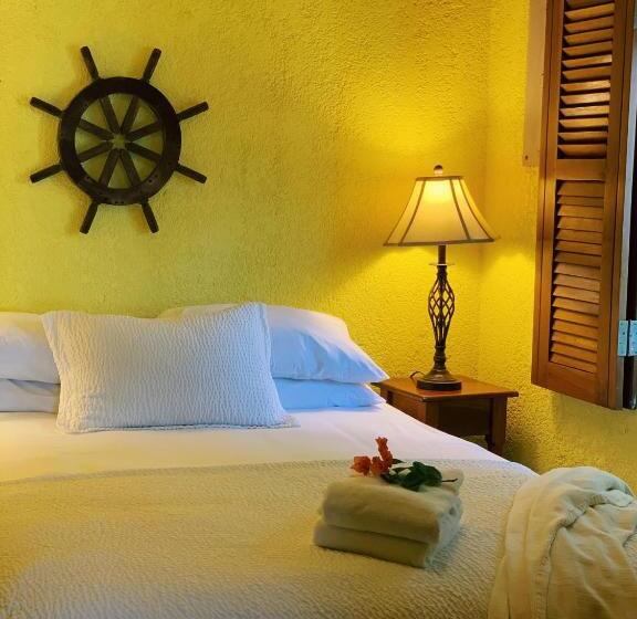 فندق Caye Casa