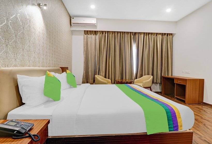 Отель Treebo Trend Shri Aprameya Resort