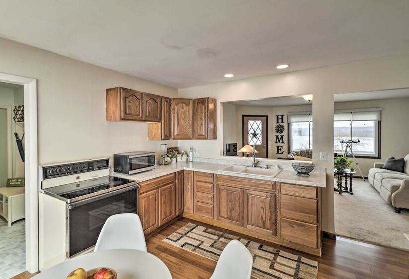 Watch The Sunrise At This Quaint Lake View Cottage