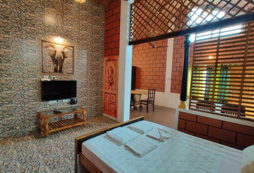 בית מלון כפרי Thiruchitrambalam Palace Resort