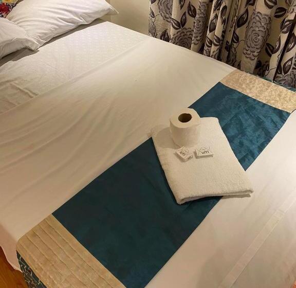 فندق صغير Rj Travellers Inn