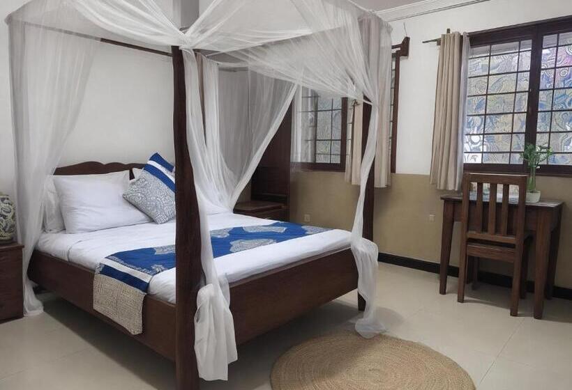 مبيت وإفطار Amber Lodge