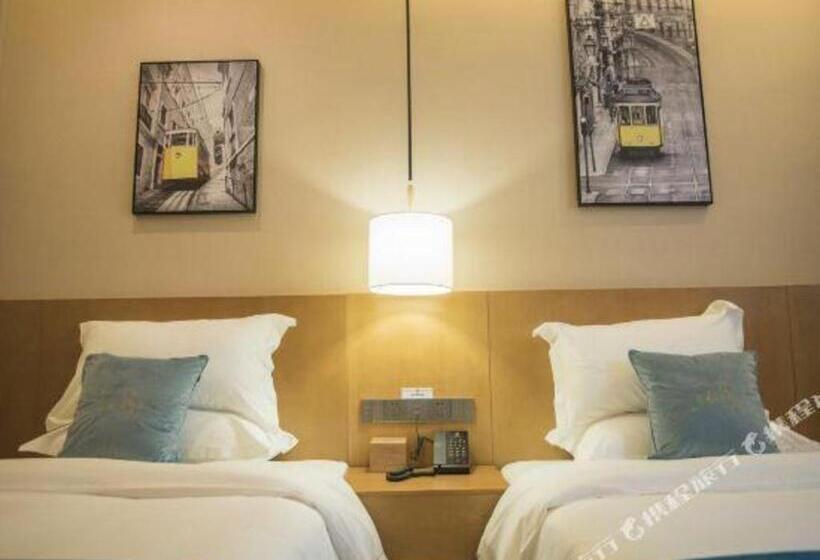 فندق Super 8 By Wyndham Shifang Urban Rail Transportation College