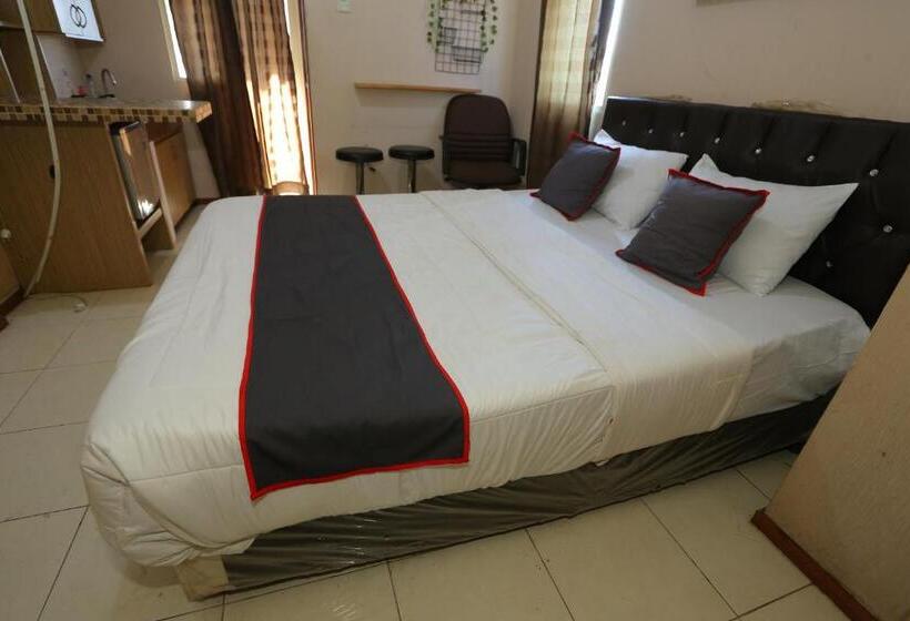 هتل Capital O 93372 Aurora Residence