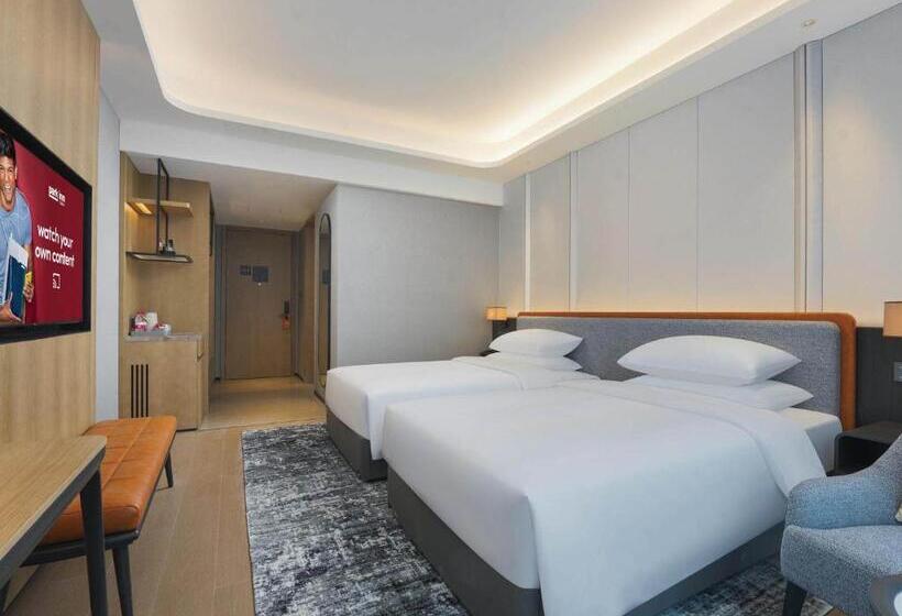 호텔 Park Inn By Radisson Nanchong Yilong Star City Plaza