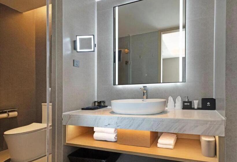 호텔 Park Inn By Radisson Nanchong Yilong Star City Plaza