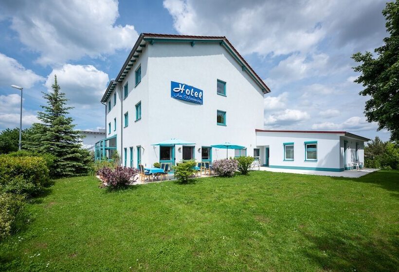 Отель Am Wiesenweg L 24h Check In