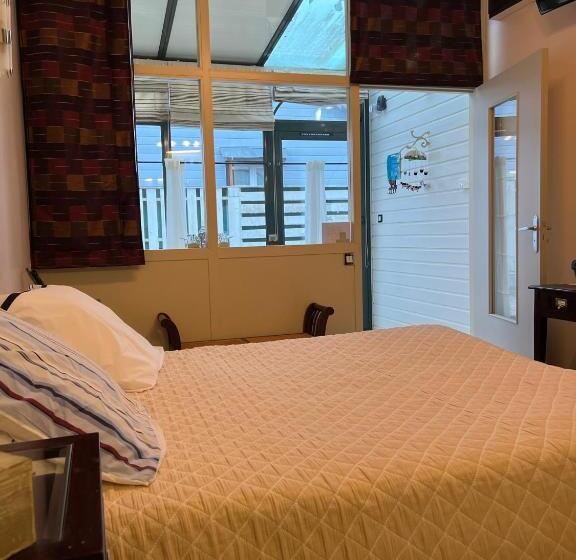 ホテル Hôtel Le Manoir Aux Vaches