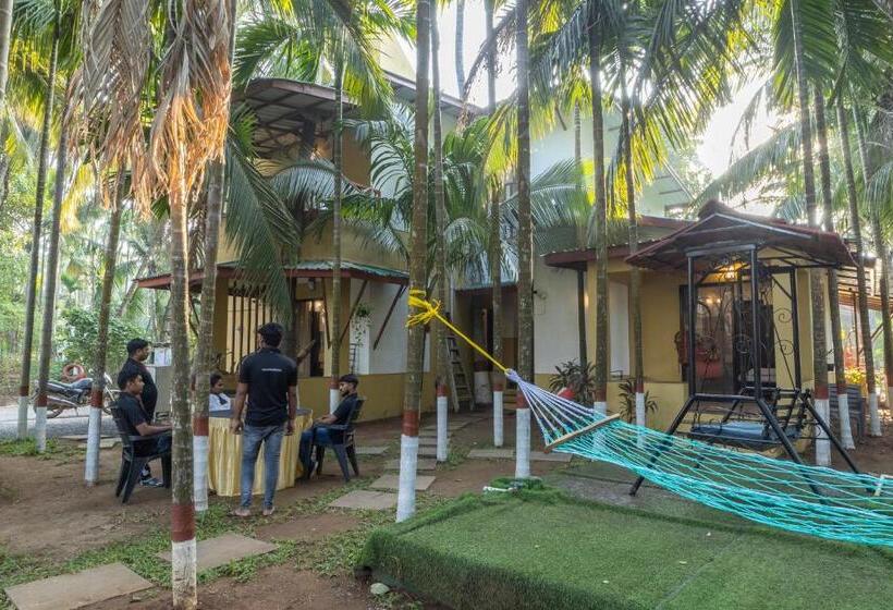 호텔 Ll Empyrean Stay Ll Coconut Beach Farm Resort Ll