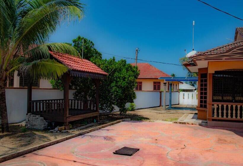 ペンション Beachland Guesthouse