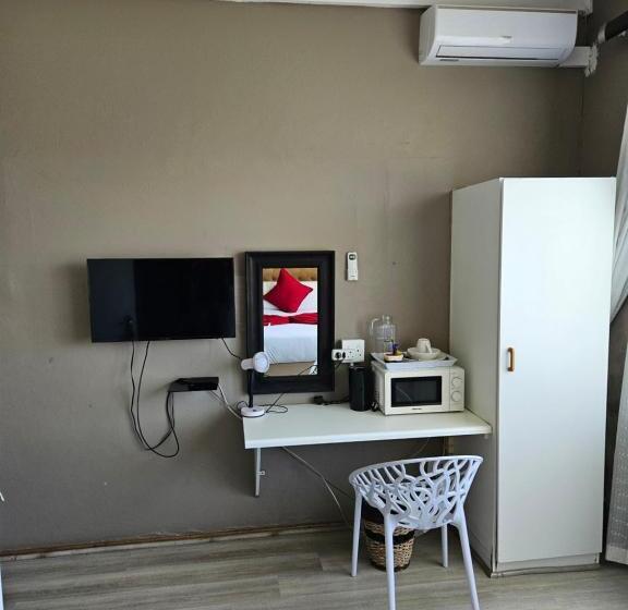 פנסיון John Bailie Guest Lodge