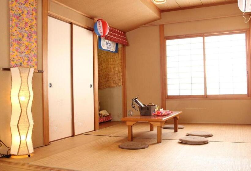 فندق صغير Okinawa Minshuku Kariyushi