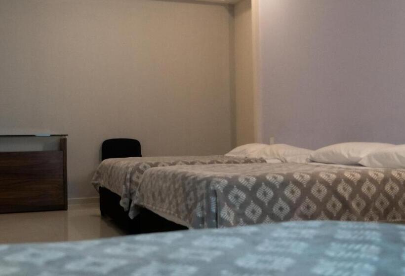 Infinity Suites Habitación Triple 212