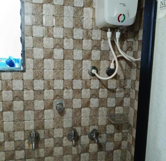 호텔 Datta Srushti Cottage Alibaug