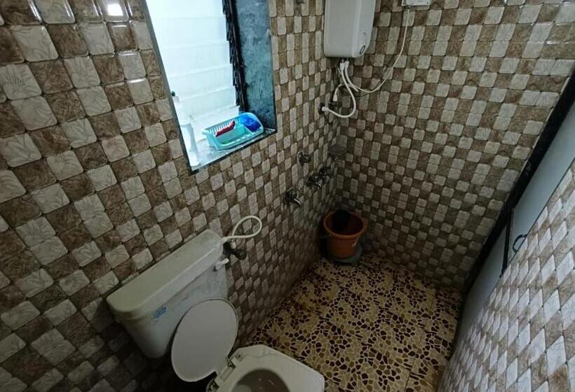 호텔 Datta Srushti Cottage Alibaug