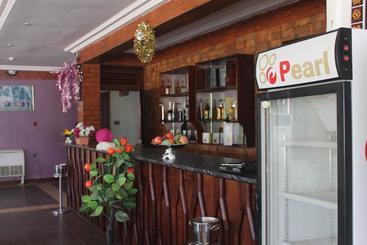 هتل Oguaa Apartments & Lodging